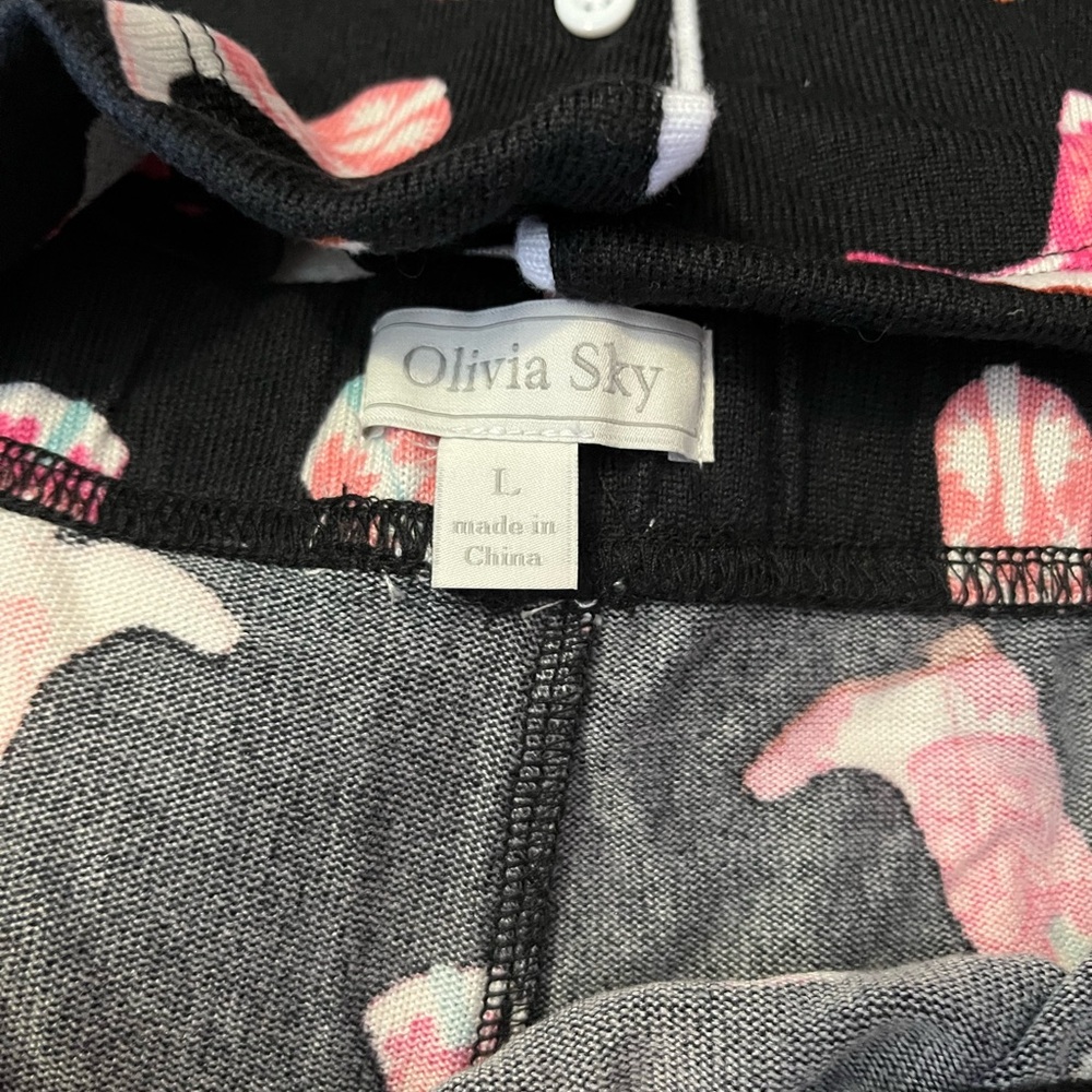 Olivia Sky Black Top with cowboy boots Accents